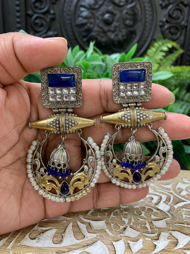 Taha dual tone chandbali style German silver earring blue