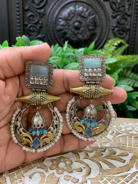 Taha dual tone chandbali style German silver earring light blue