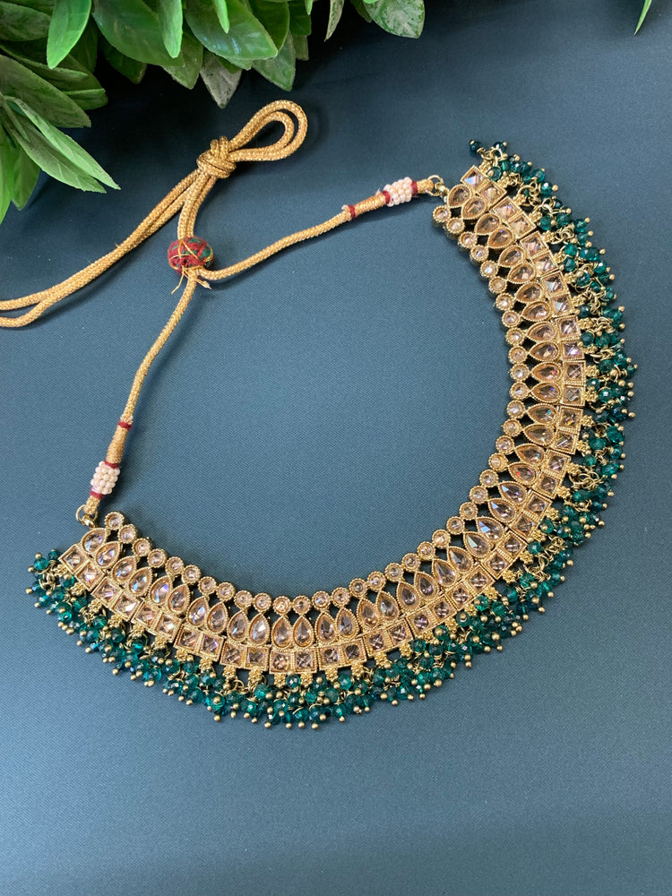 Rashmeet polki necklace with matching earring tikka antique gold teal green