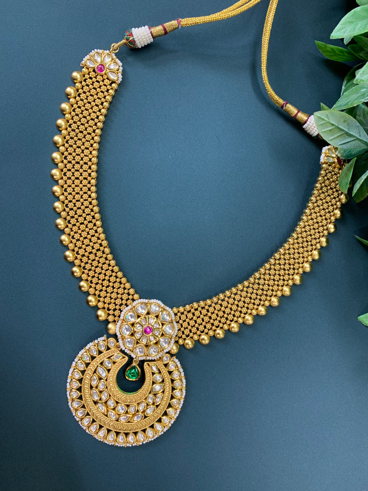 Gold plated tyaani kundan pendant necklace