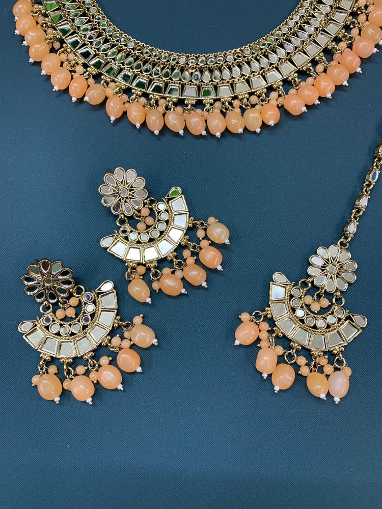 Shreya mirror necklace set with matching Chandbali antique peach