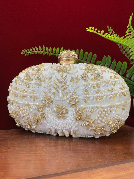 Women’s handbag/clutch bright white and gold embroidered