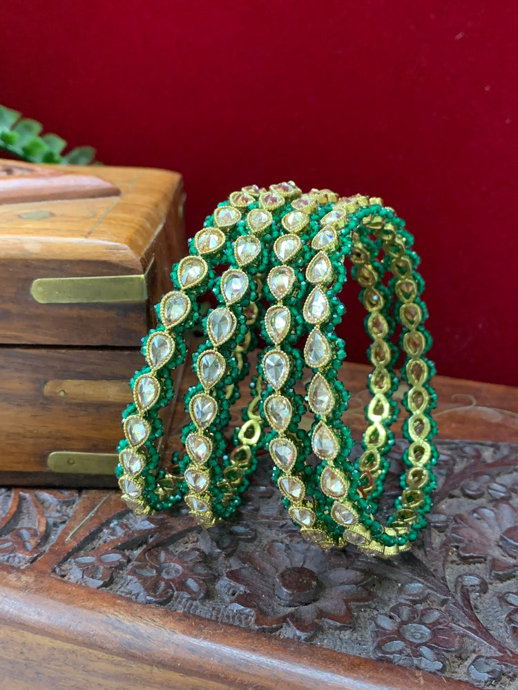 Reverse polki bangle Sonia in antique gold emerald green pearl details