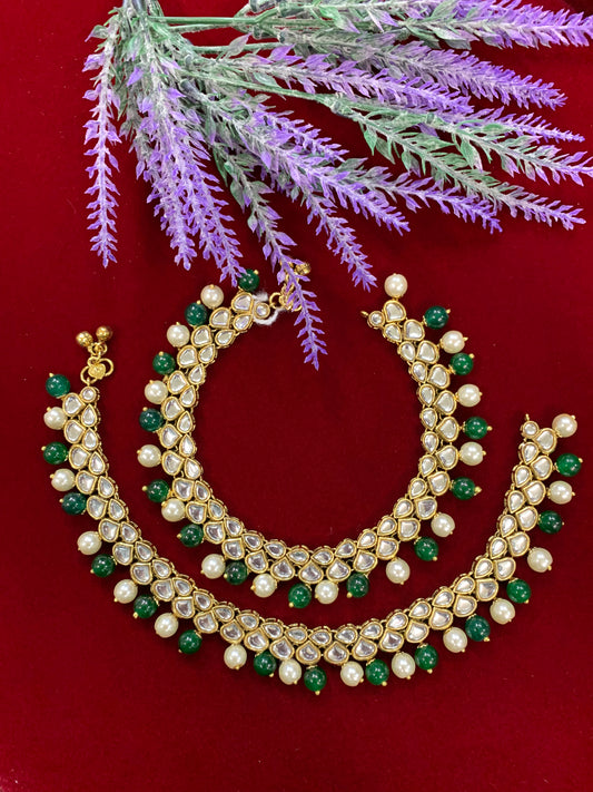 Kundan payal anklet set with emerald green beads and bells