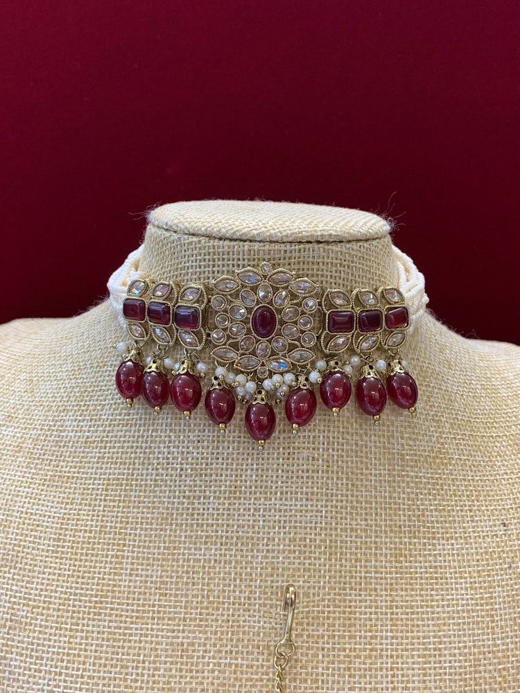 Reverse polki choker set with matching Tikka and chandbali earring