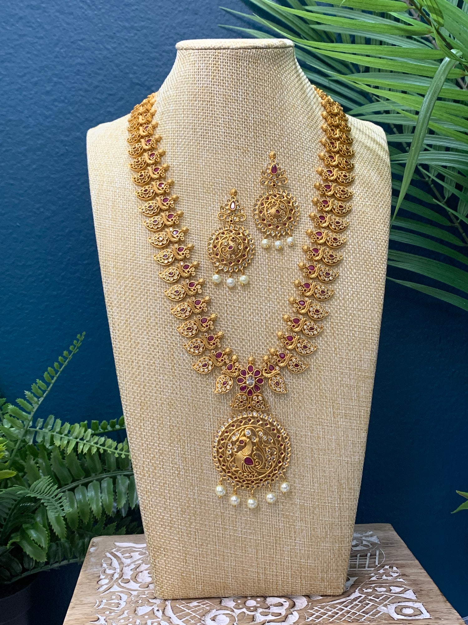 Temple style gold long mala rani haram with matching earring
