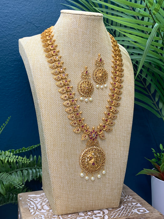 Temple style gold long mala rani haram with matching earring