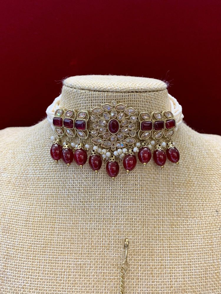 Reverse polki choker set with matching Tikka and chandbali earring