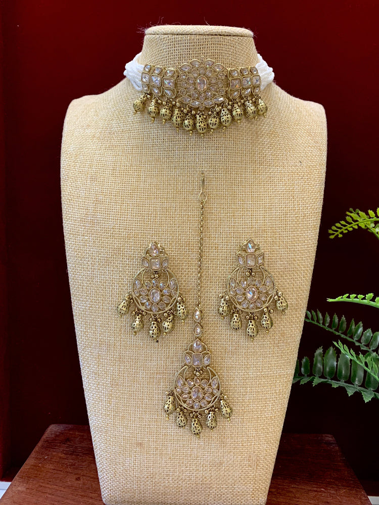 Reverse polki choker set with matching Tikka and chandbali earring