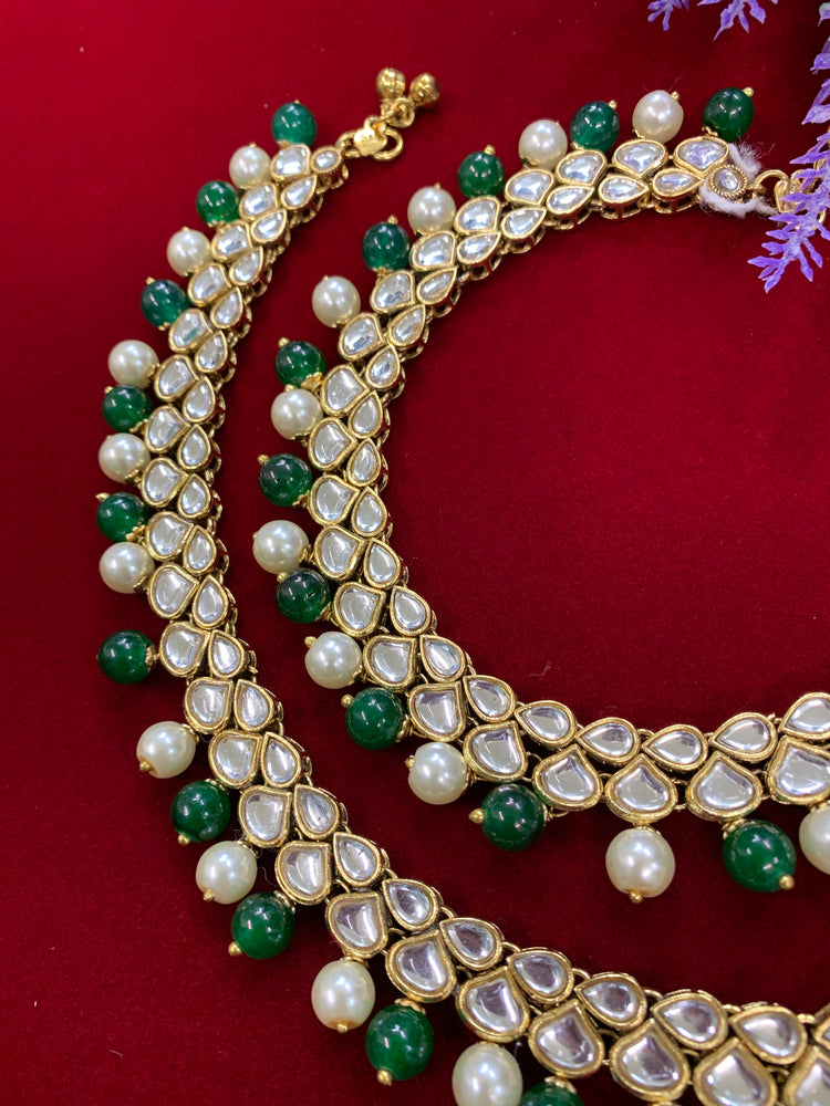 Kundan payal anklet set with emerald green beads and bells