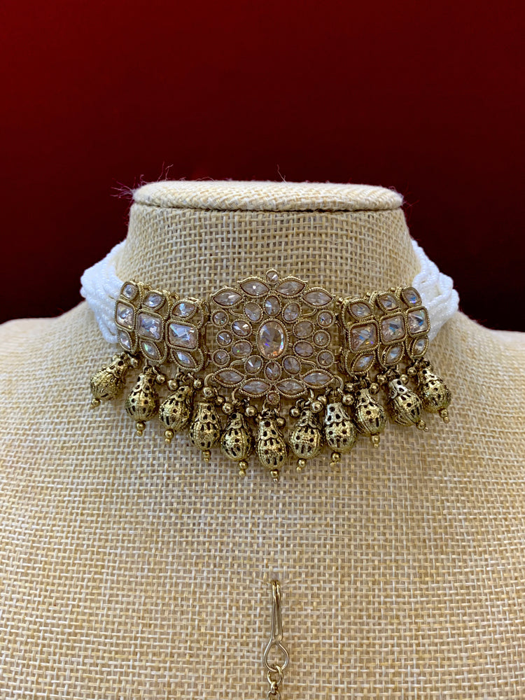 Reverse polki choker set with matching Tikka and chandbali earring