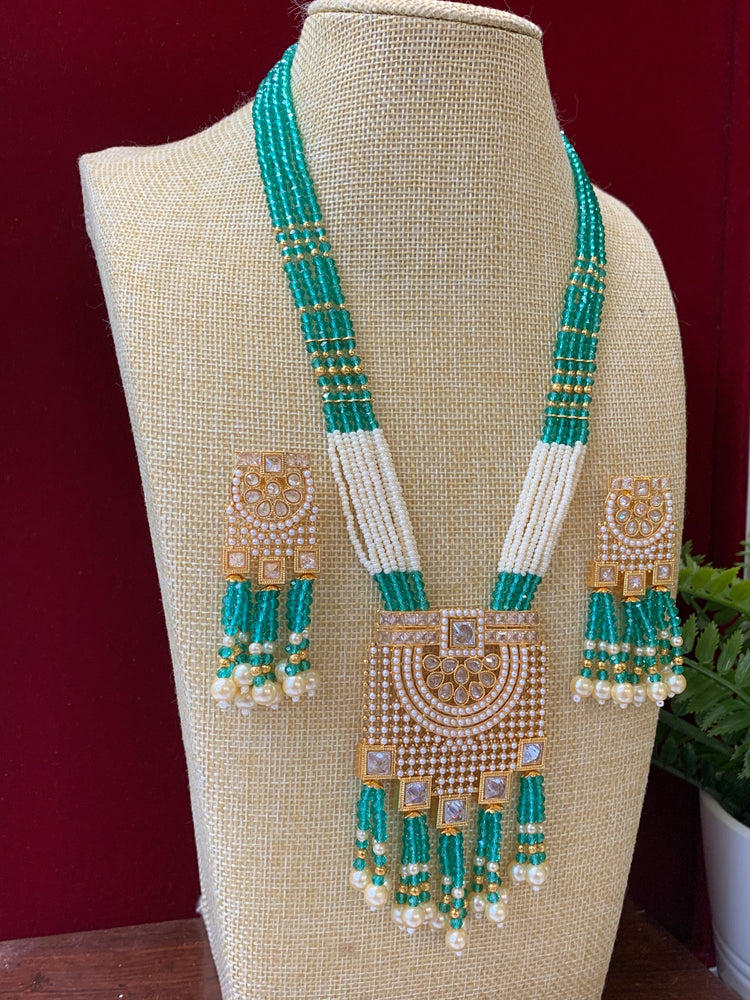 Anika polki long mala set gold polki and teal blue