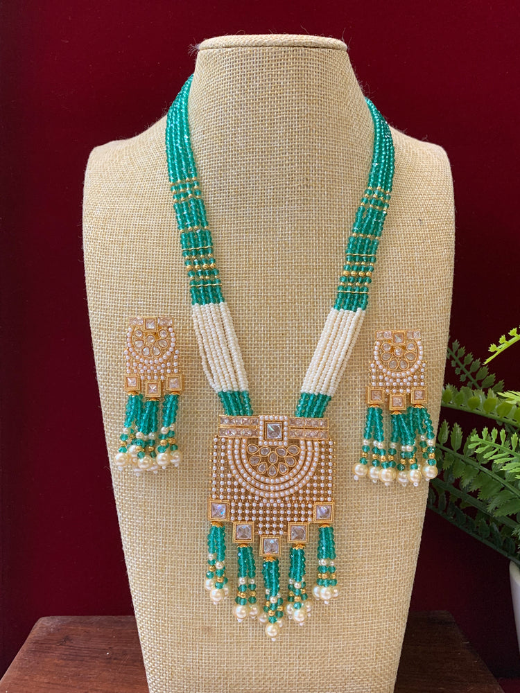 Anika polki long mala set gold polki and teal blue