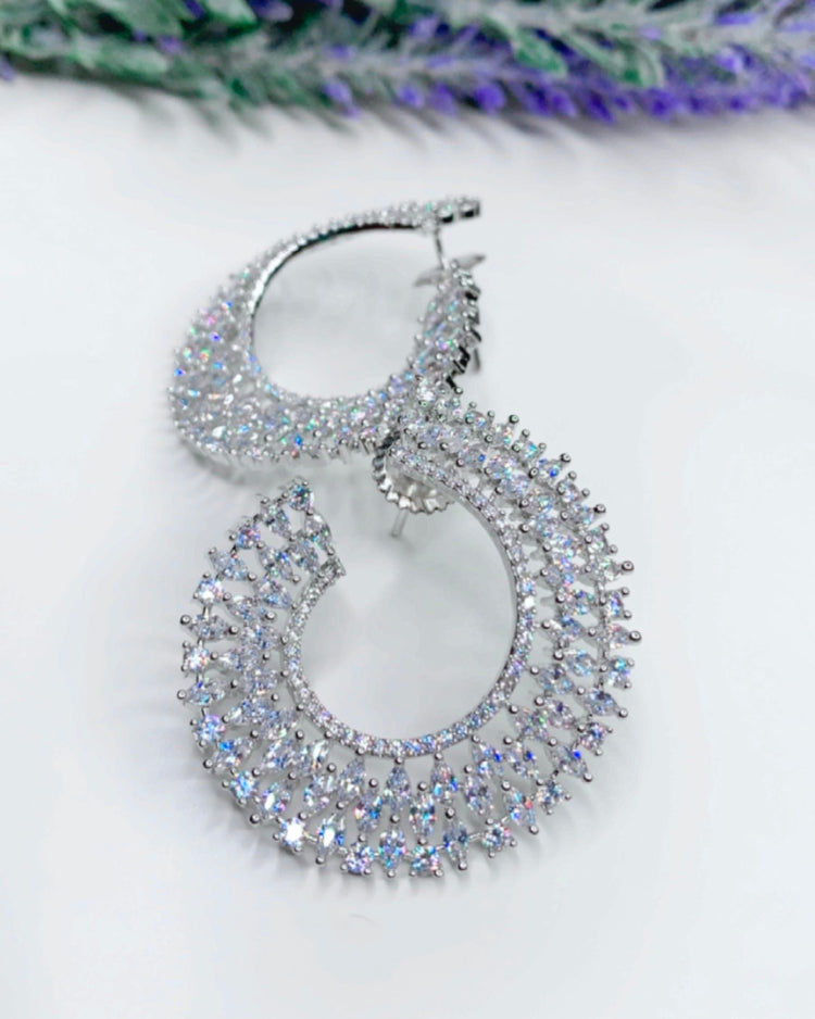 “Twisted love” American diamond hoop earring