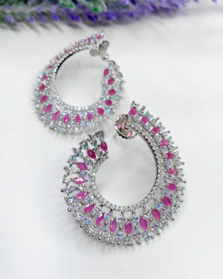 “Twisted love” American diamond hoop earring