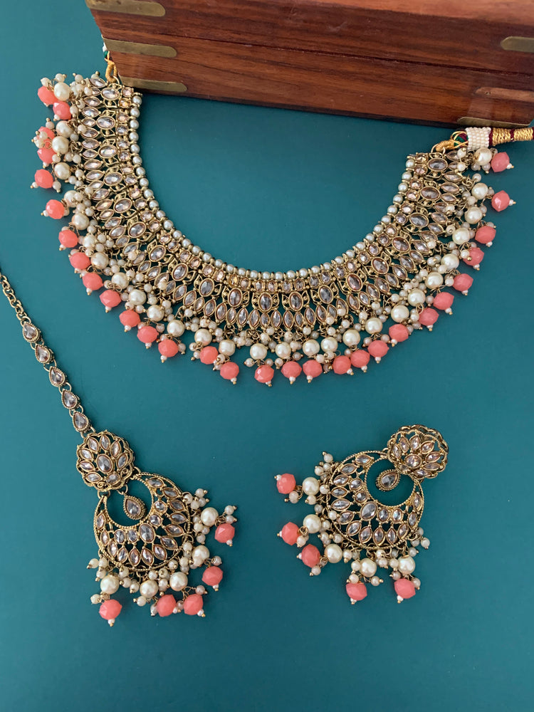 Khusboo polki necklace in grapefruit color