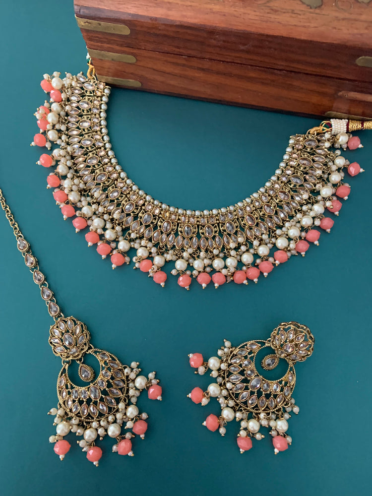 Khusboo polki necklace in grapefruit color