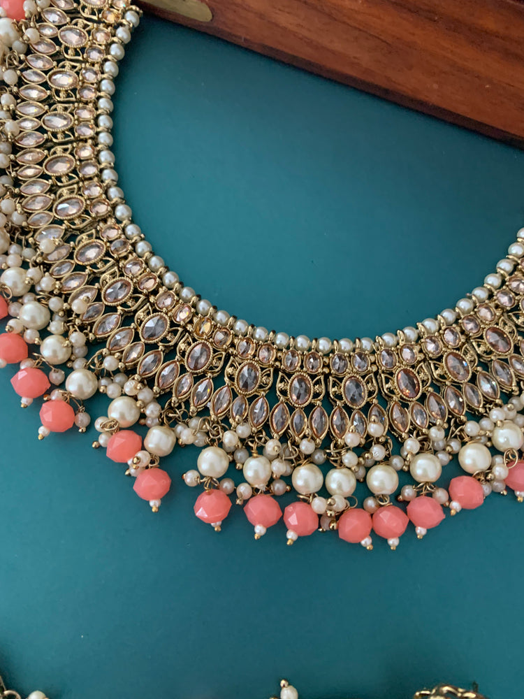 Khusboo polki necklace in grapefruit color