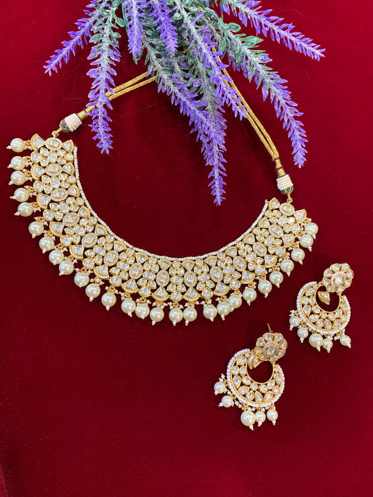 Tyaani uncut Kundan necklace choker set