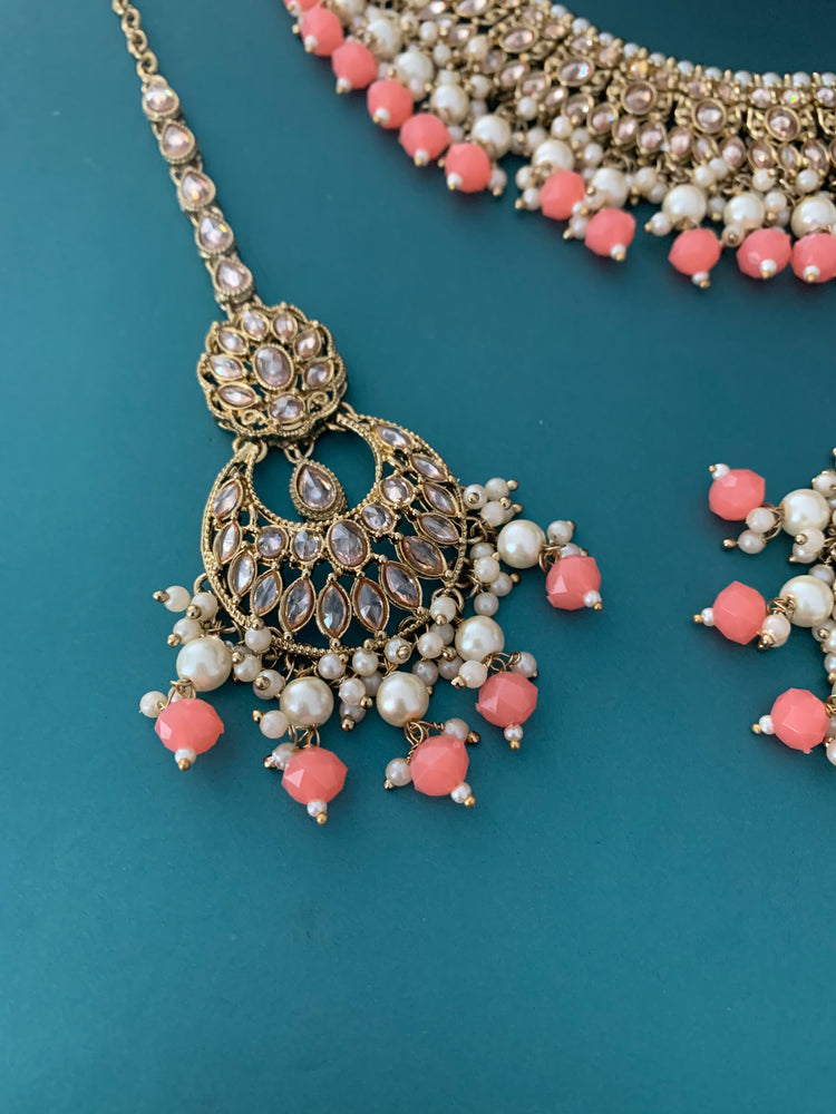 Khusboo polki necklace in grapefruit color