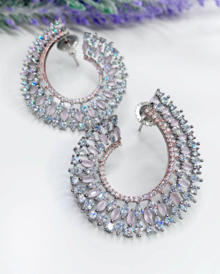 “Twisted love” American diamond hoop earring