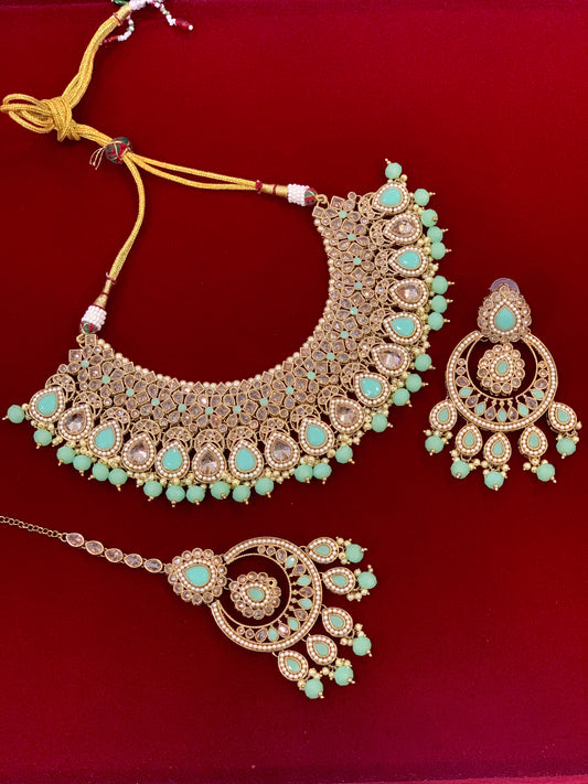 Polki necklace with chandbali and Tikka