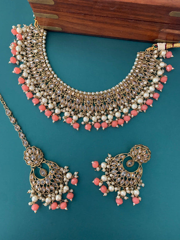 Khusboo polki necklace in grapefruit color