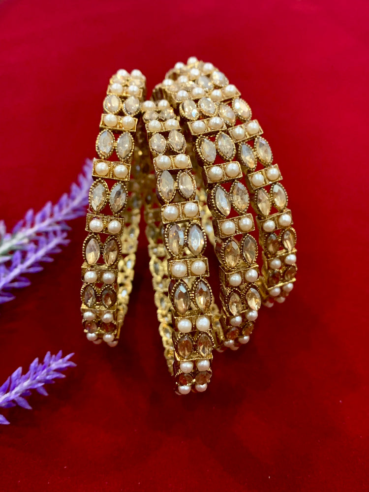 Antique polki bangles with pearl details