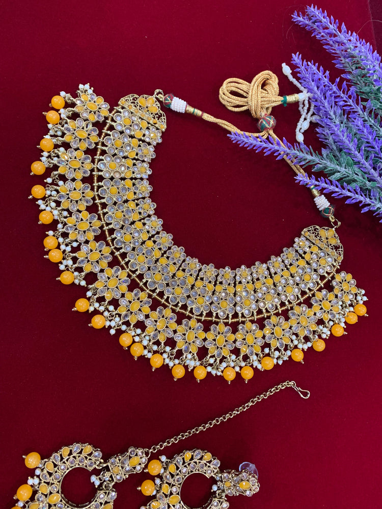Reverse Polki necklace with earring and Tikka pastel yellow