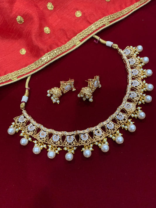 Gold polki necklace with grey meena work