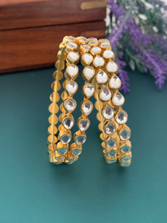 Gold plated pachi kundan bangle comes in a pair