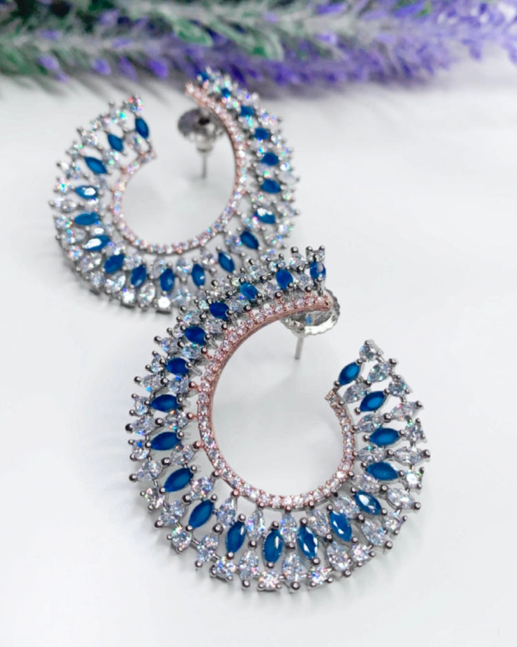 “Twisted love” American diamond hoop earring