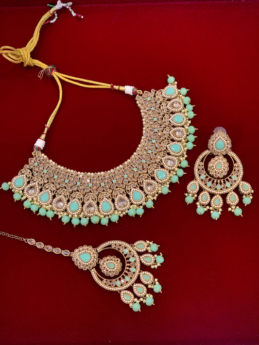 Polki necklace with chandbali and Tikka