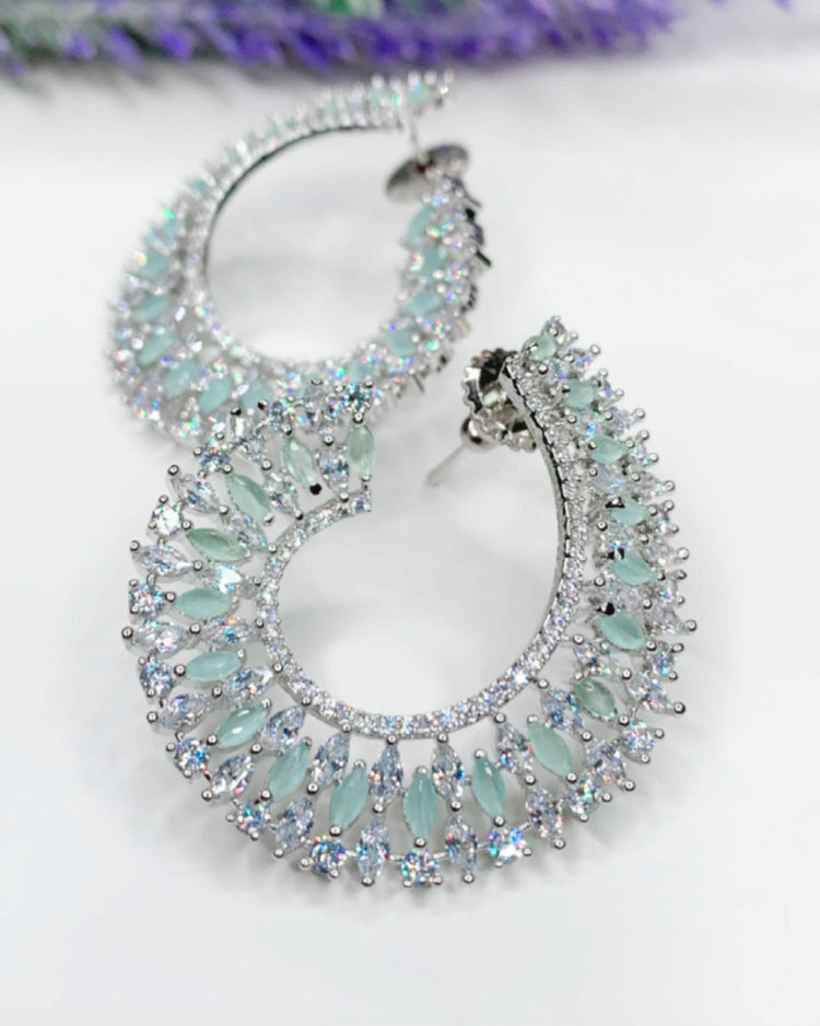 “Twisted love” American diamond hoop earring