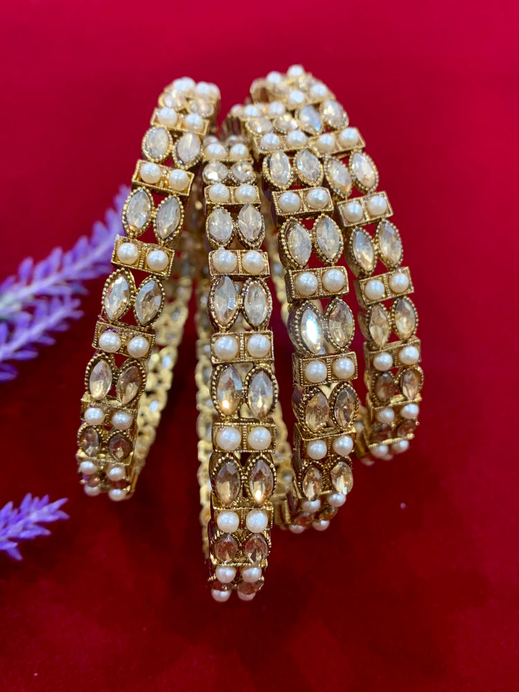 Antique polki bangles with pearl details