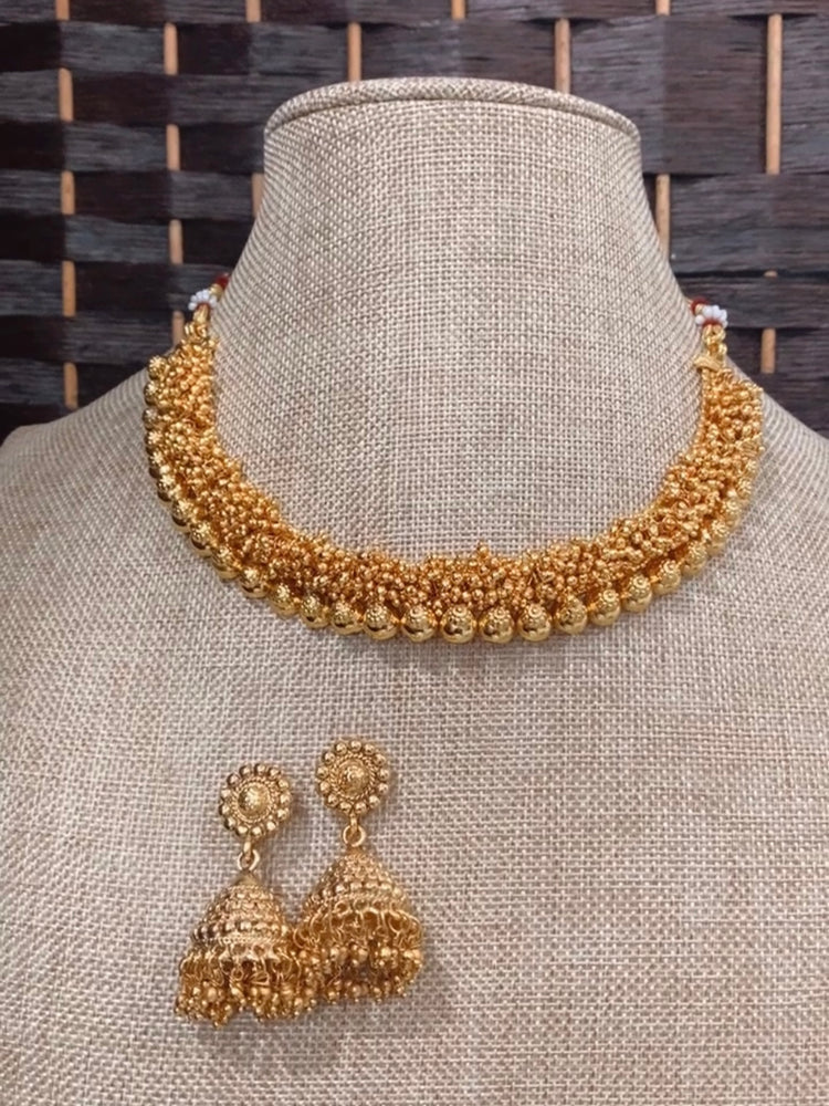 Temple style gold necklace with jhumki
