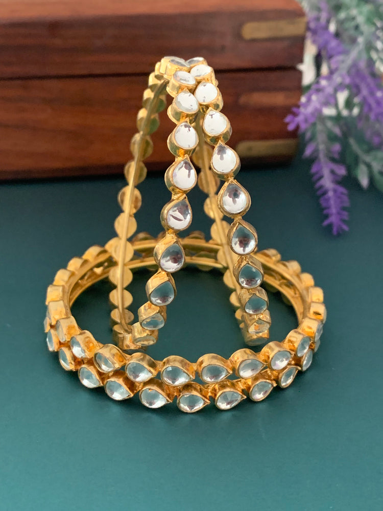 Gold plated pachi kundan bangle comes in a pair