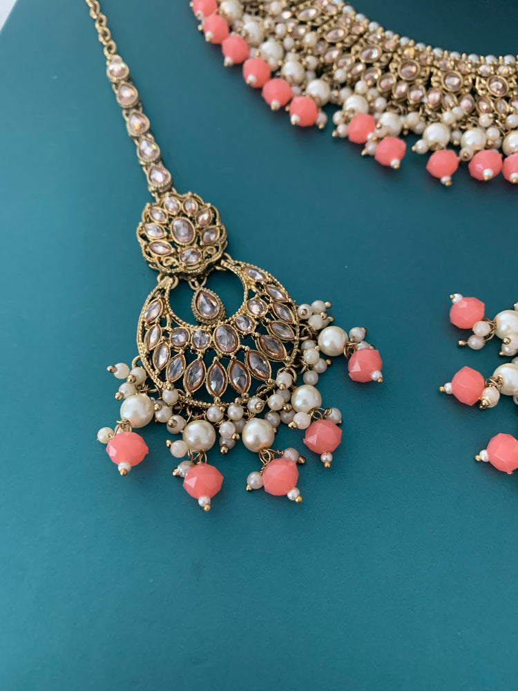 Khusboo polki necklace in grapefruit color