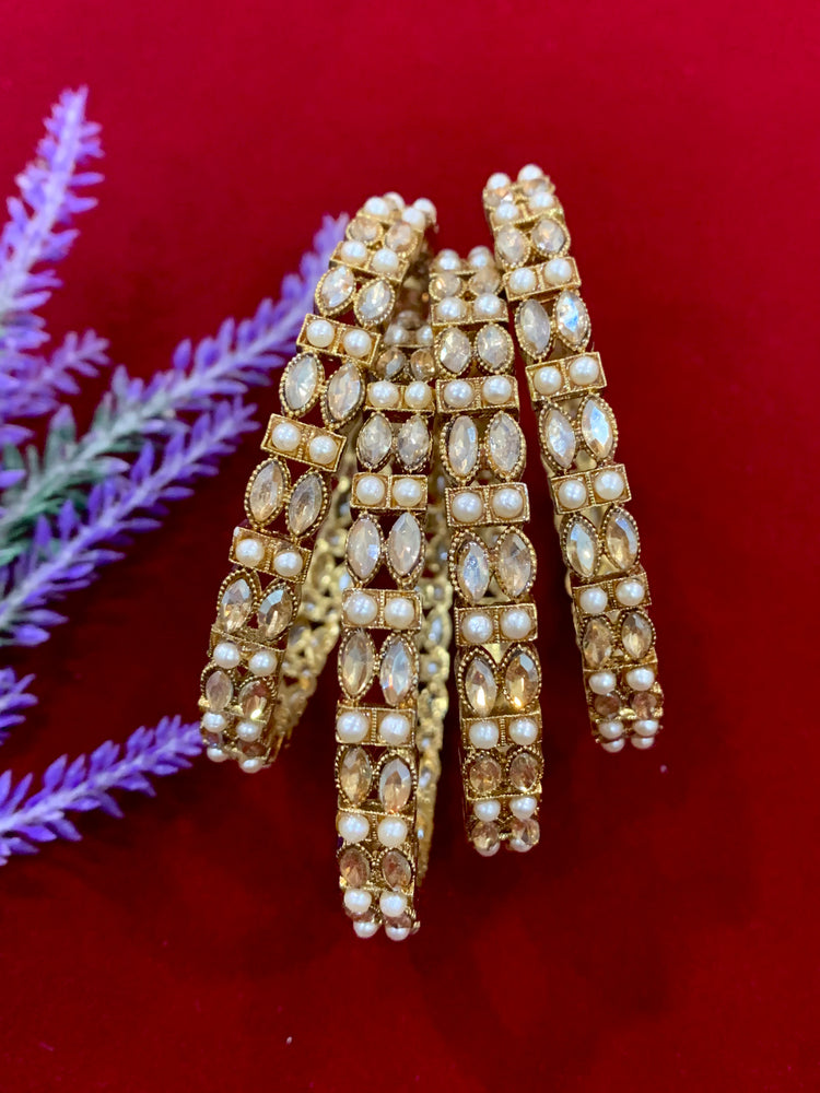 Antique polki bangles with pearl details