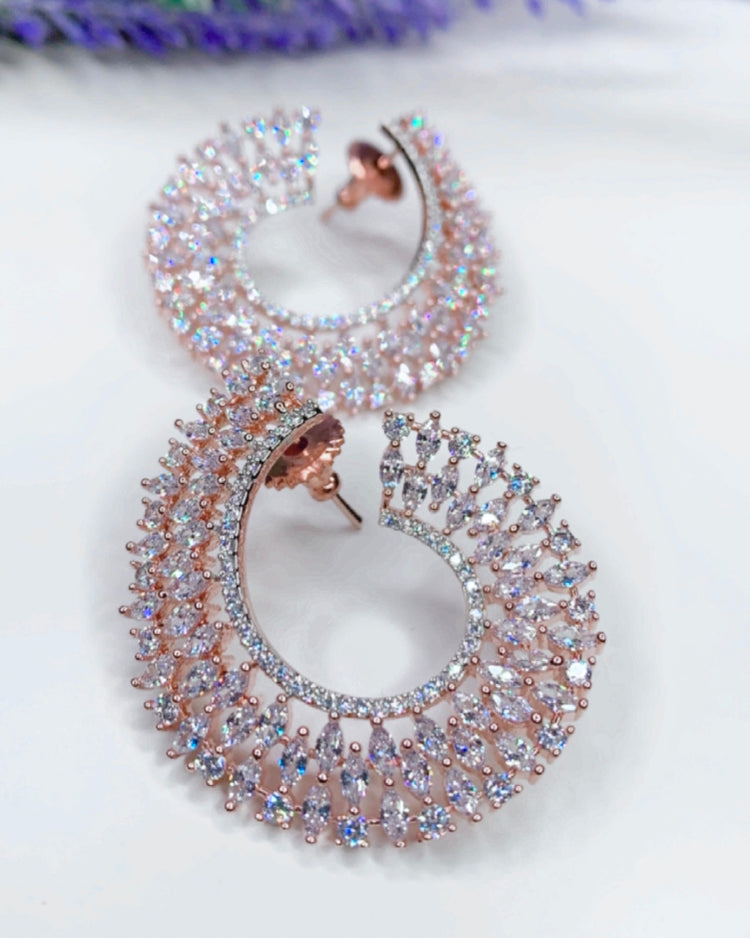 “Twisted love” American diamond hoop earring