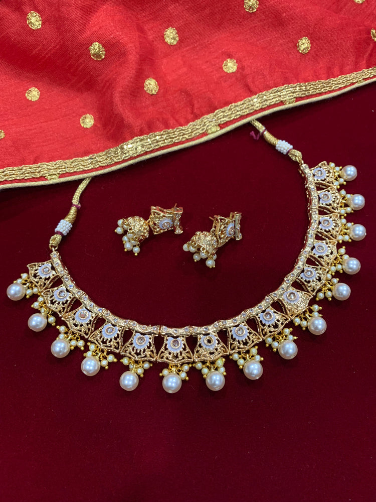 Gold polki necklace with grey meena work